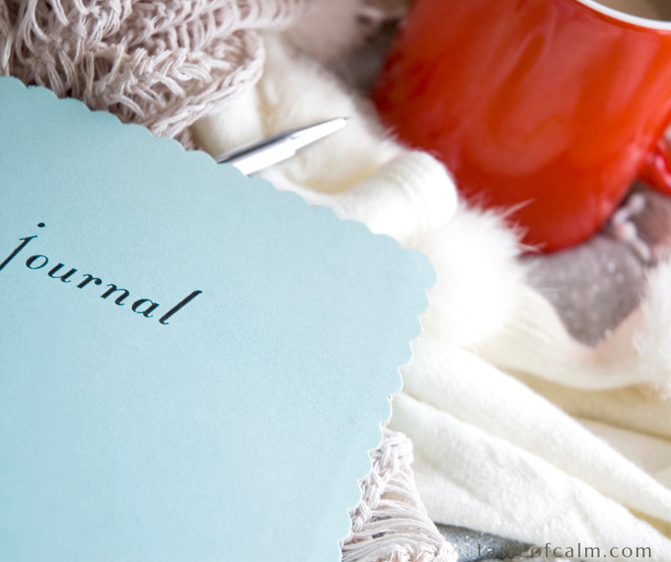 A reading journal is on the bed
