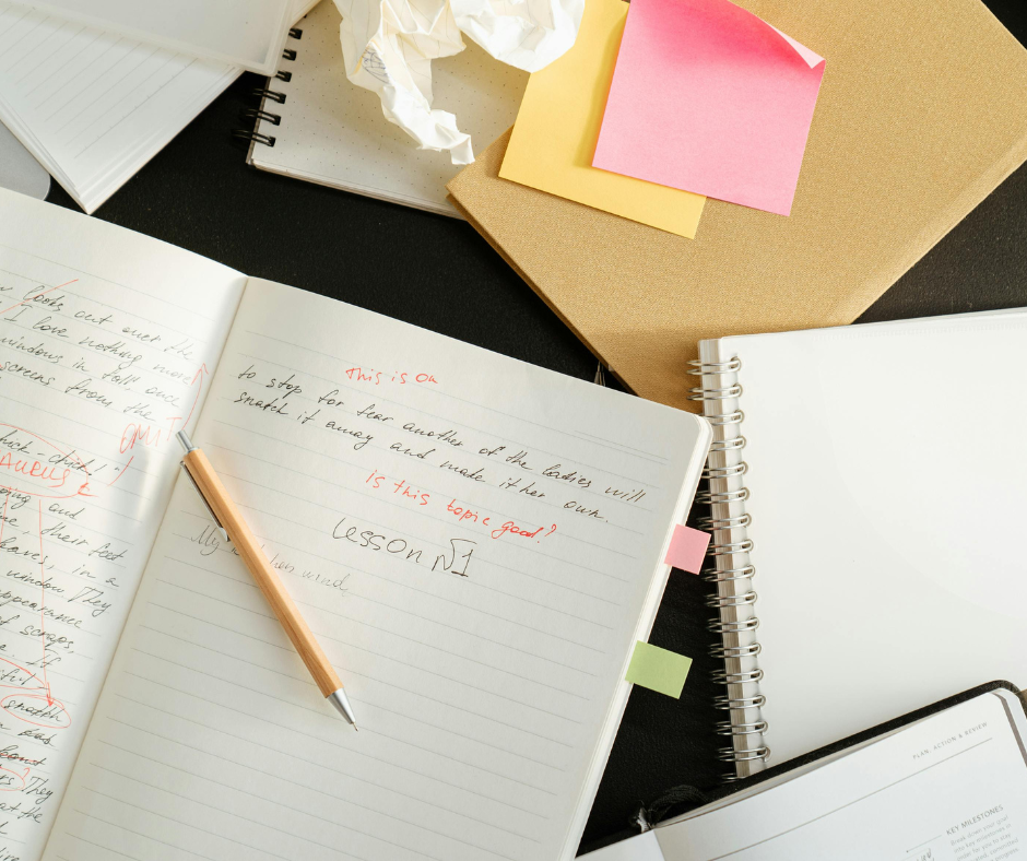 A journal is on the desk, and a pen next to it. This is a journal for Morning pages.