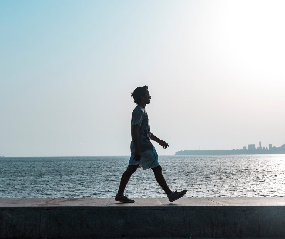 Man walking by the sea
