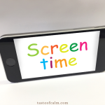 Mobile phone with the Screen time written on the screen