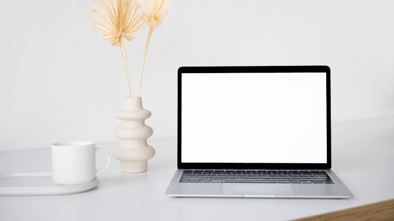 Photo of the laptop on a desk representing screen time