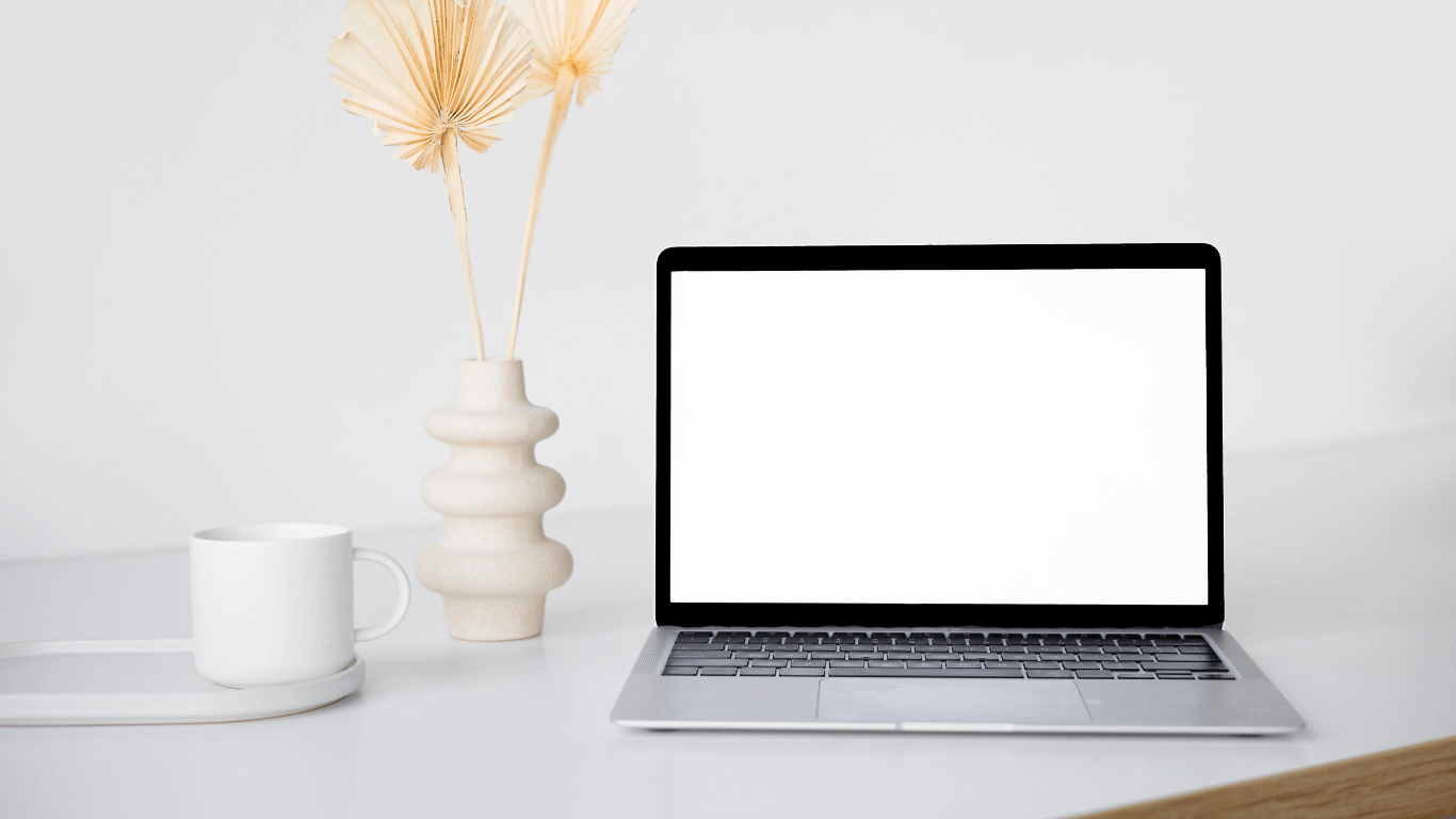 Photo of the laptop on a desk representing screen time