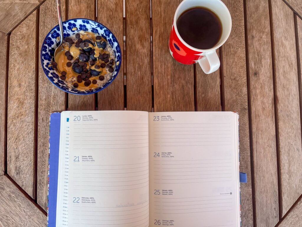 Photo of an open journal on the desk. I use it for end-of-year journaling.